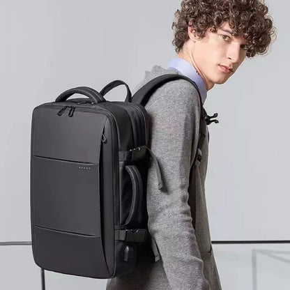 Bange BG-1908 ist ein großer, erweiterbarer, wasserdichter Business‑ und Reiserucksack, der Laptops bis 17,3 Zoll fasst und durch USB‑Port.